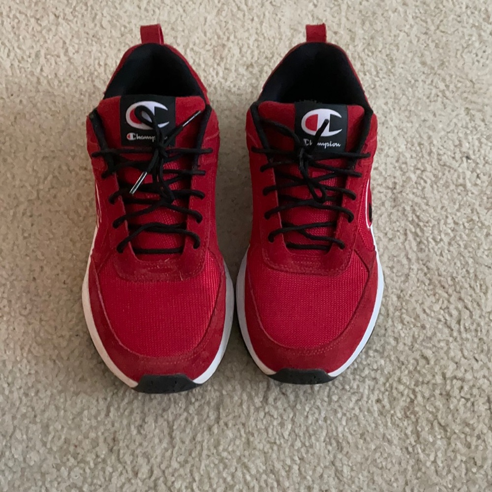 Red champion shoes with black laces